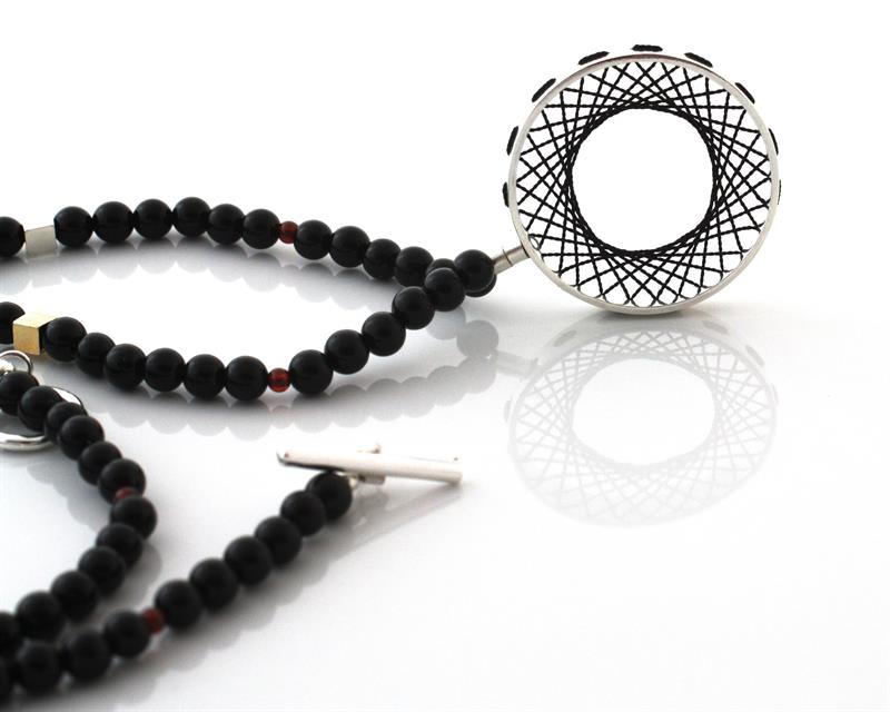 Sterling Silver Ring woven with Black Silk, Onyx and Garnet